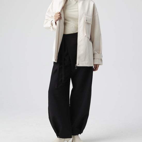 Model wears Black Pants