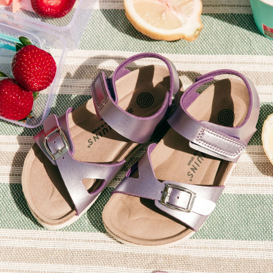 Model wears Melos Shiny Purple