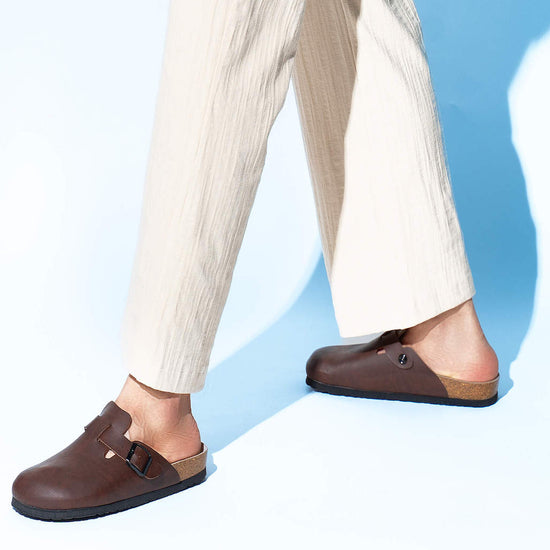 Model wears Riva Light Brown Clogs