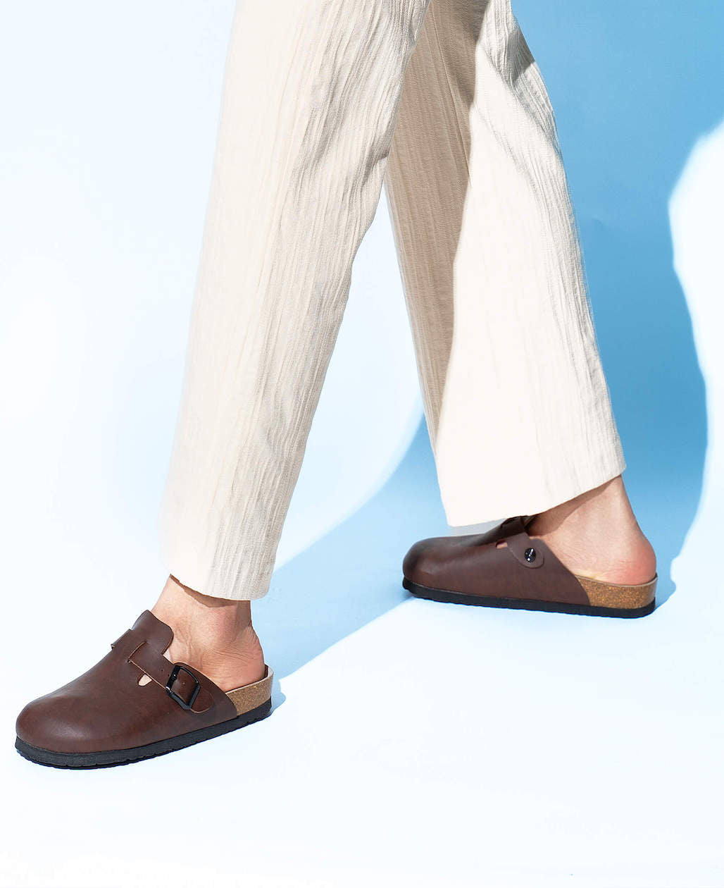 Model wears Riva Light Brown Clogs