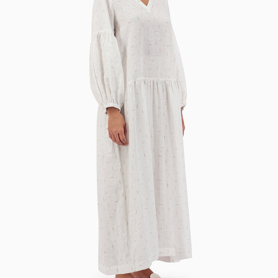 Model wears White V-neck Dress