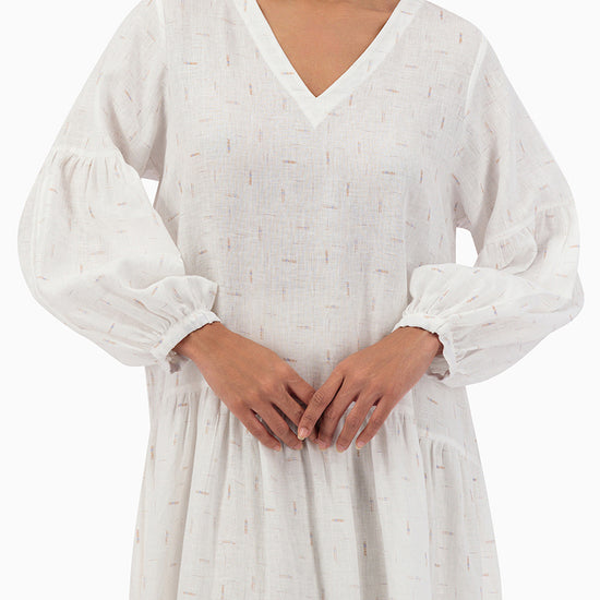 Model wears White V-neck Dress