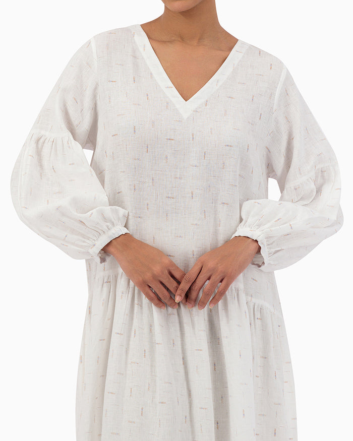 Model wears White V-neck Dress