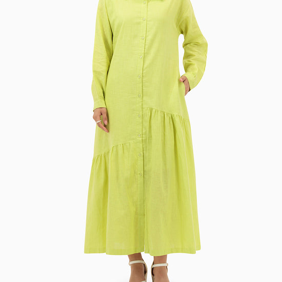 Model wears Green Dress