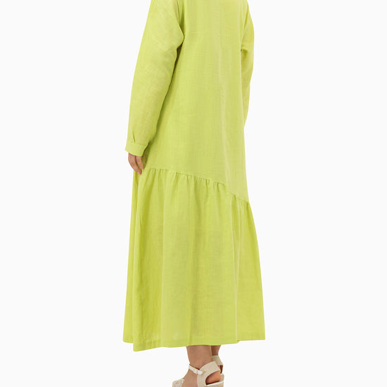 Model wears Green Dress