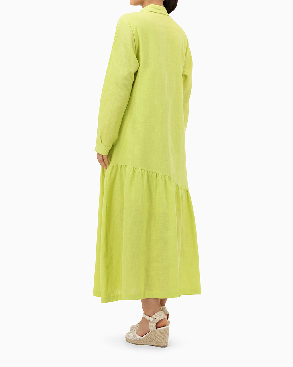 Model wears Green Dress