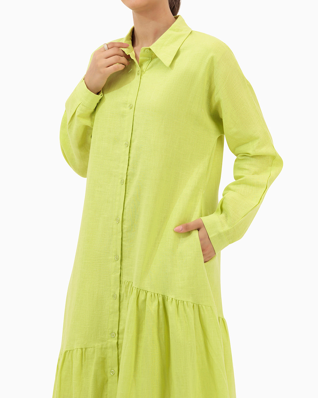 Model wears Green Dress