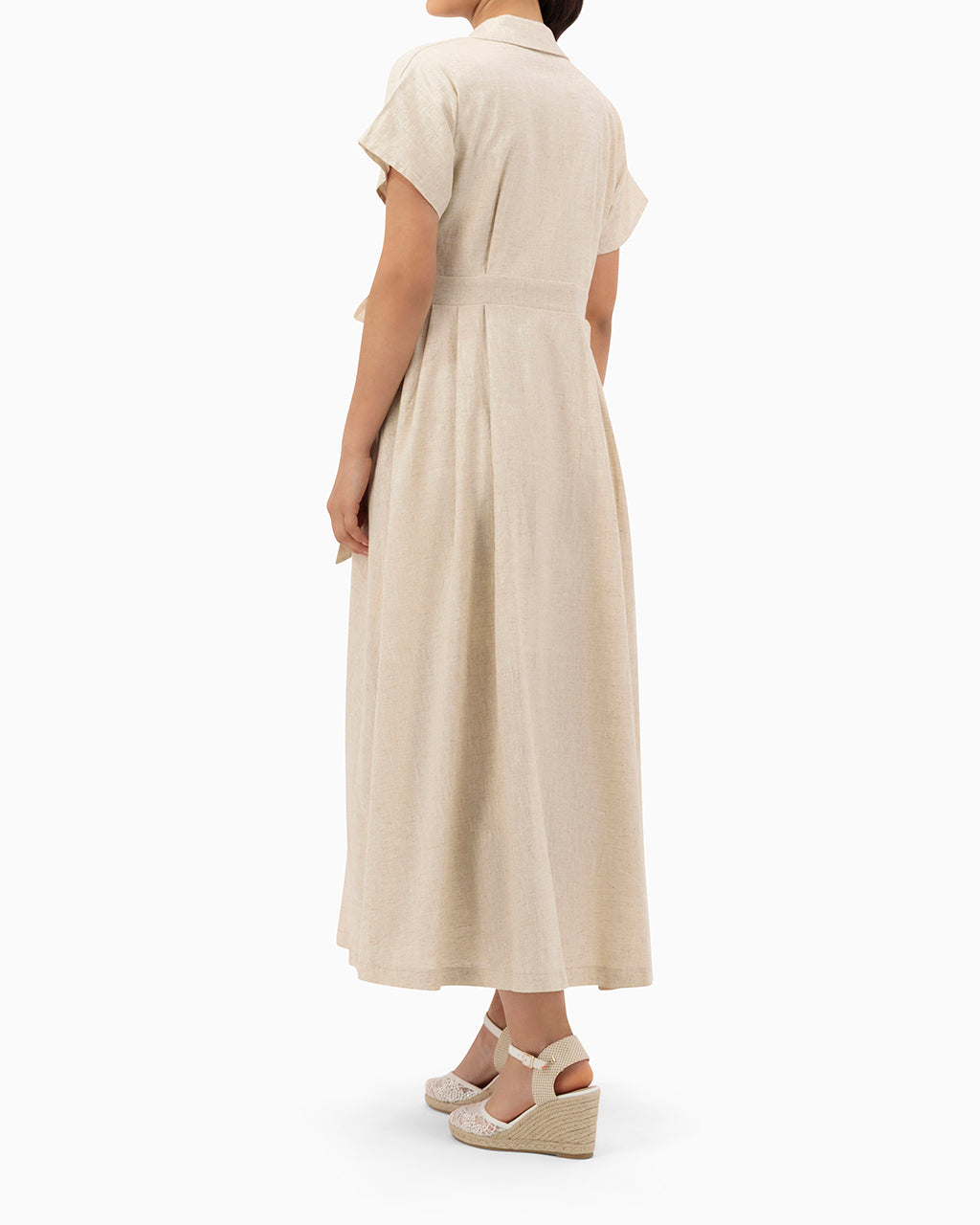 Model wears Beige Wrap Dress