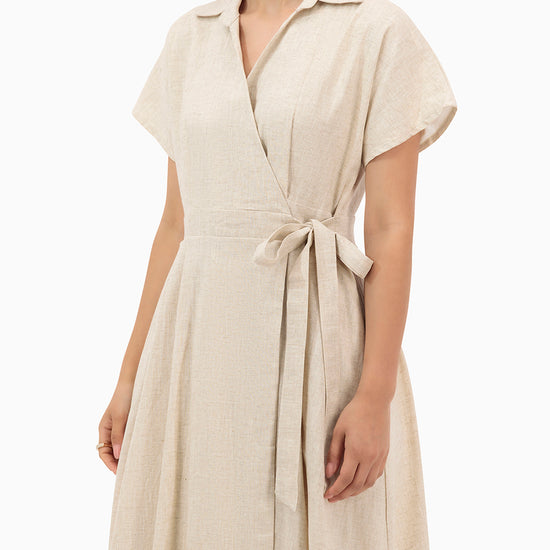 Model wears Beige Wrap Dress
