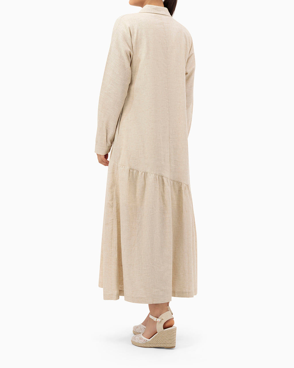 Model wears Beige Dress