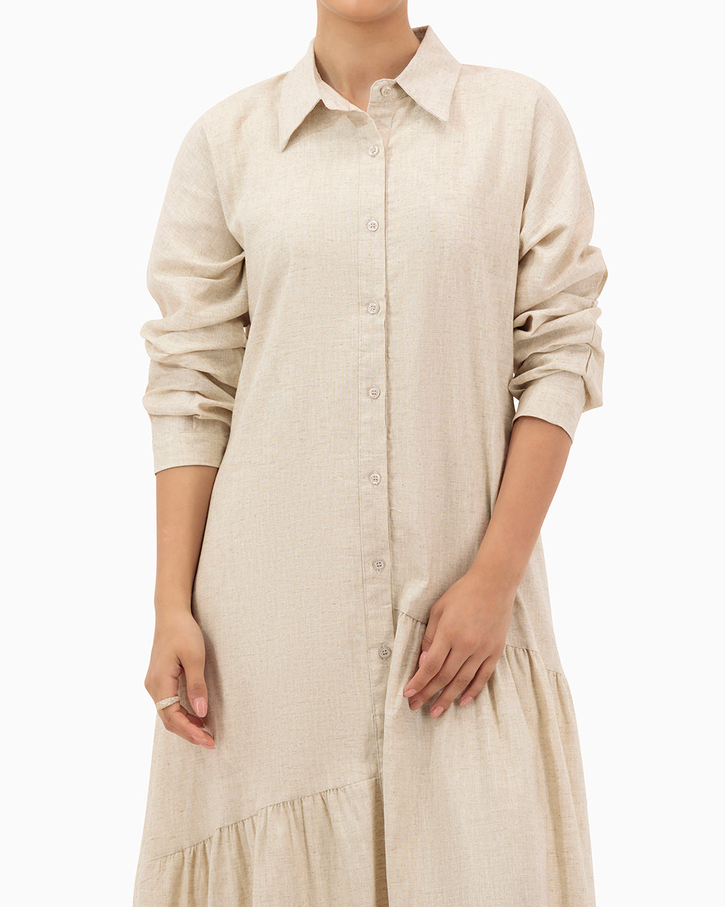 Model wears Beige Dress