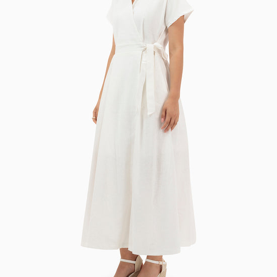 Model wears White Wrap Dress