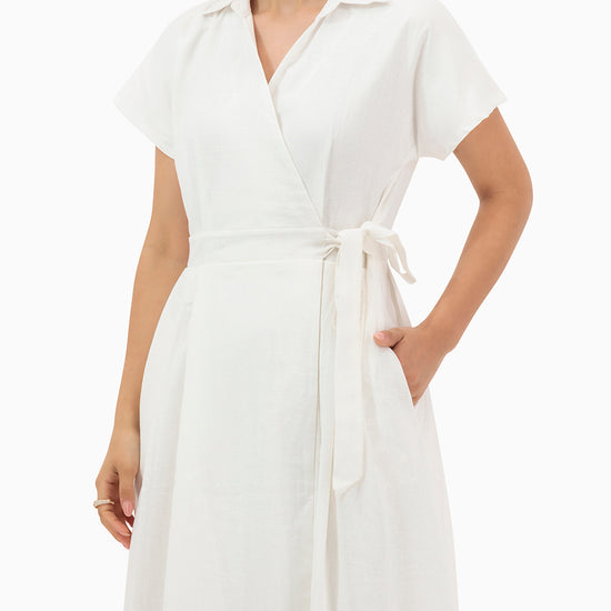 Model wears White Wrap Dress