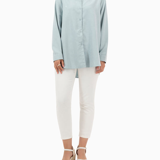 Model wears Turquoise Shirt With Strass