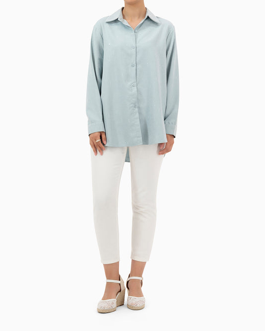 Model wears Turquoise Shirt With Strass