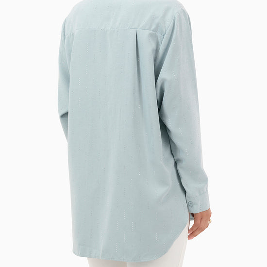 Model wears Turquoise Shirt With Strass