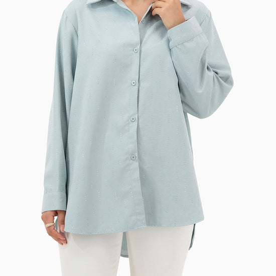 Model wears Turquoise Shirt With Strass