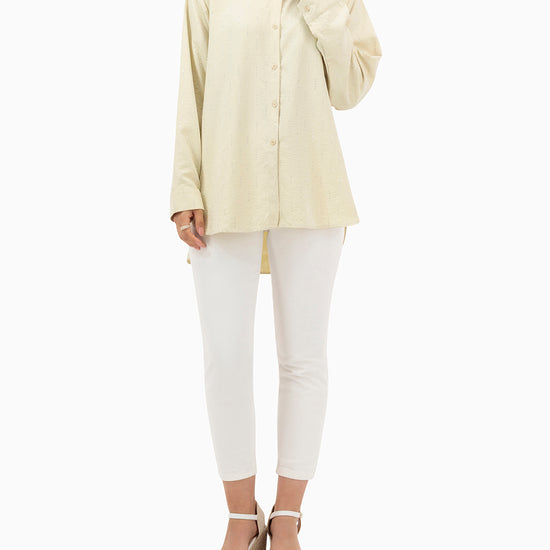 Model wears Beige Shirt With Strass