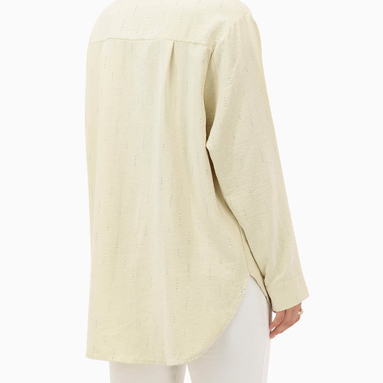 Model wears Beige Shirt With Strass