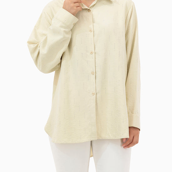 Model wears Beige Shirt With Strass