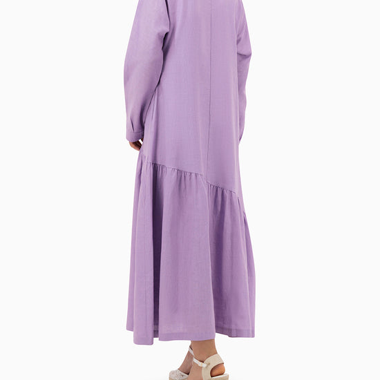 Model wears Purple Dress