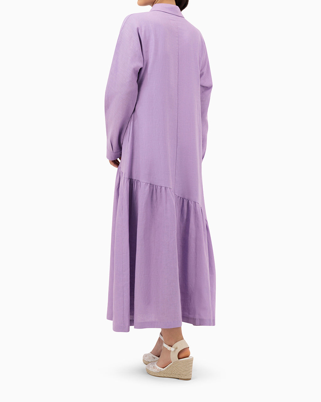 Model wears Purple Dress