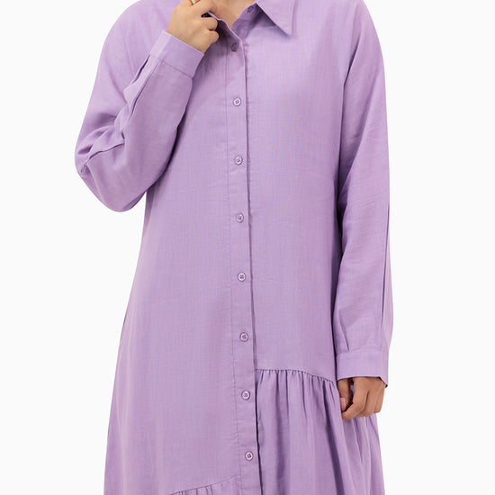 Model wears Purple Dress