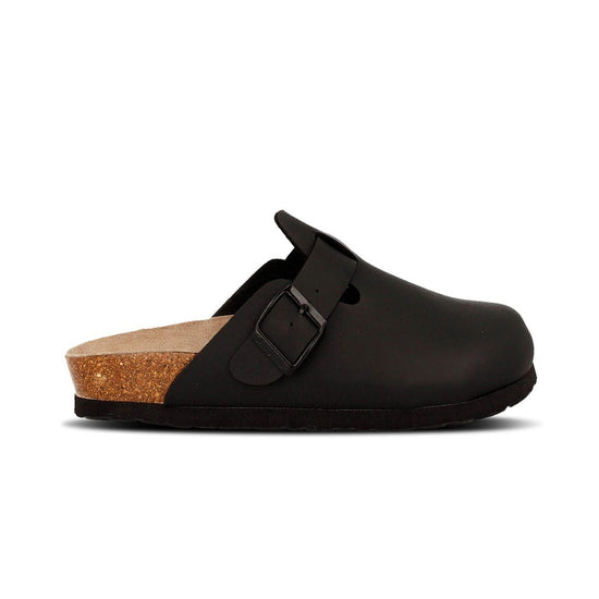 Model wears Riva Black Clogs