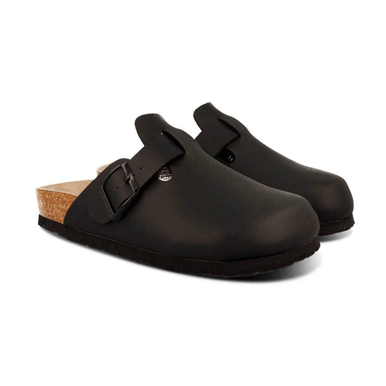 Model wears Riva Black Clogs