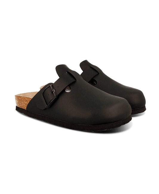 Model wears Riva Black Clogs