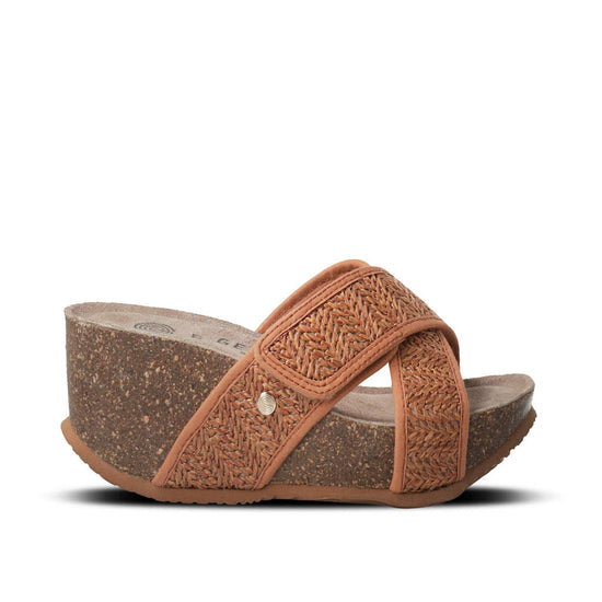 Model wears Benicasim Brown Raffia Sandal