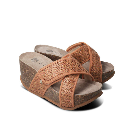 Model wears Benicasim Brown Raffia Sandal