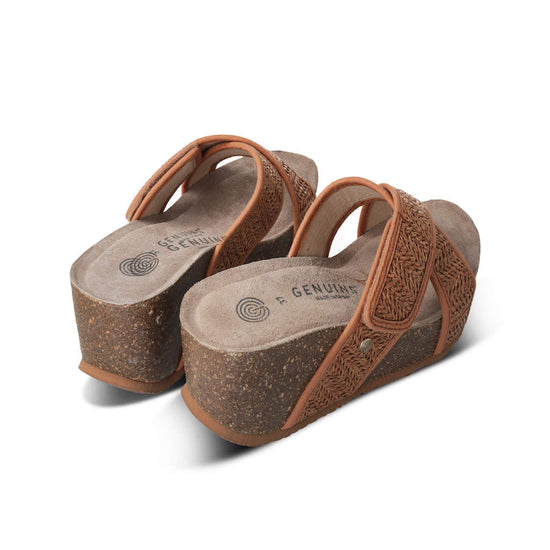 Model wears Benicasim Brown Raffia Sandal