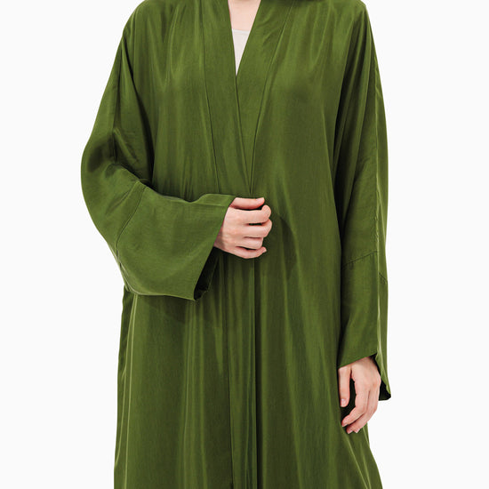Model wears Green Abaya