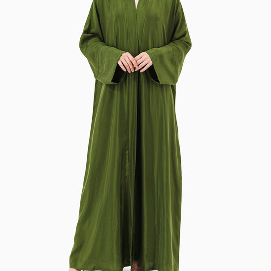Model wears Green Abaya