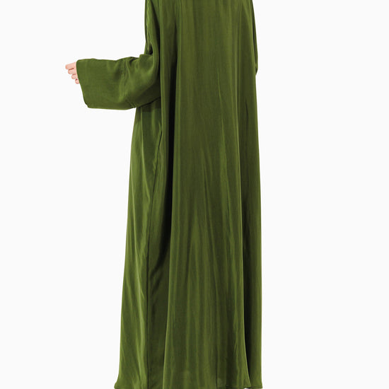 Model wears Green Abaya