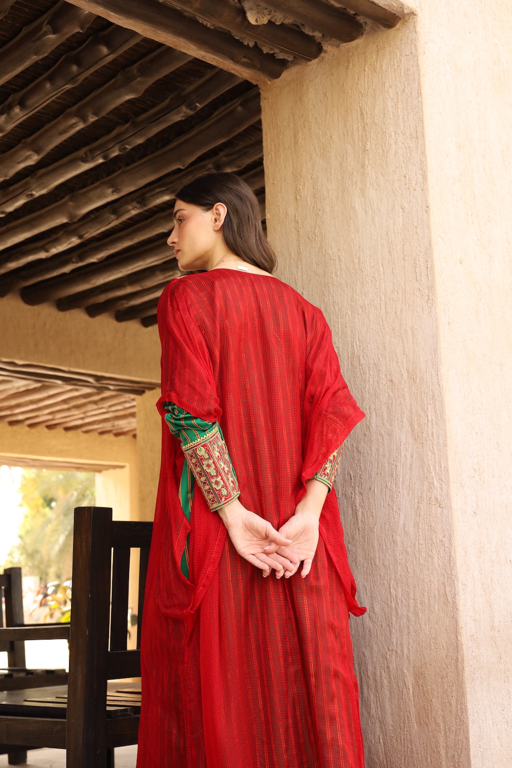 Model wears Red Striped Thob