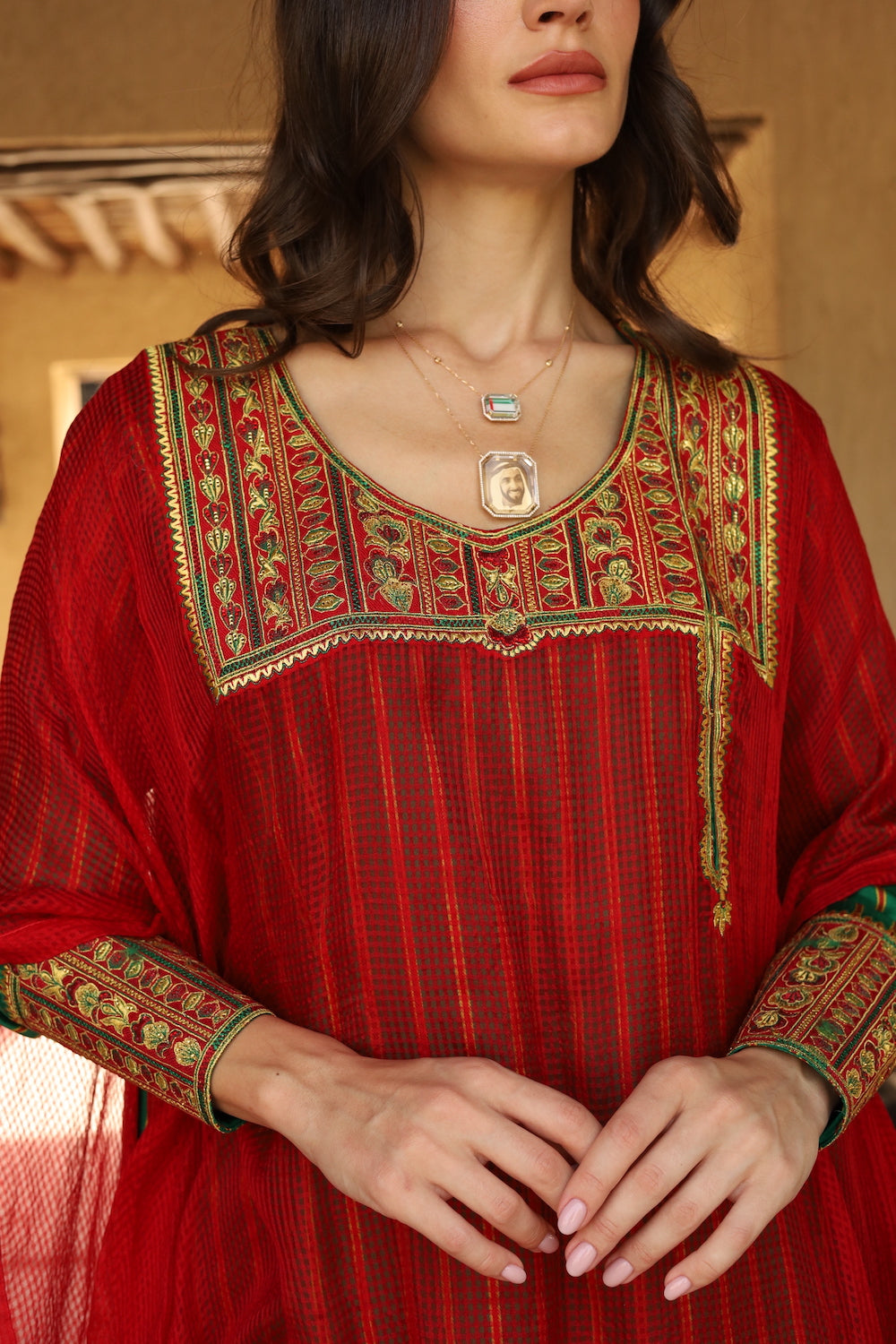 Model wears Red Striped Thob