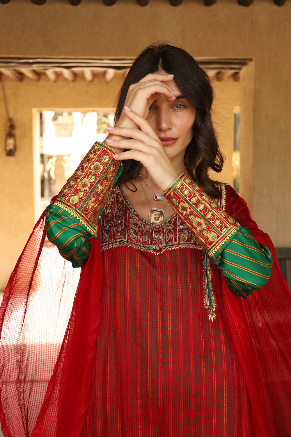 Model wears Red Striped Thob