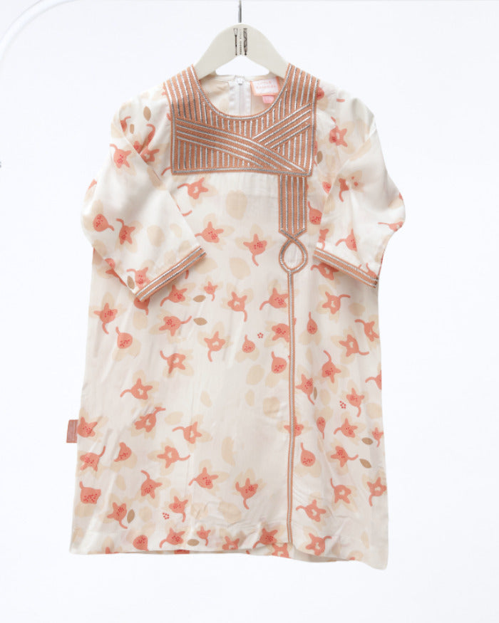 Model wears White and Peach Floral Talli