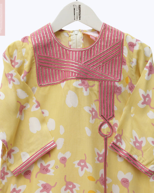 Model wears Yellow And Pink Floral Talli