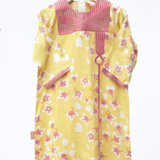 Model wears Yellow And Pink Floral Talli