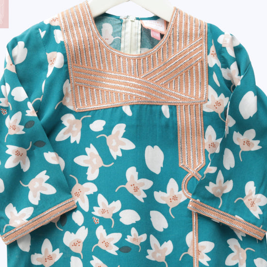 Model wears Petroleum Blue Floral Talli