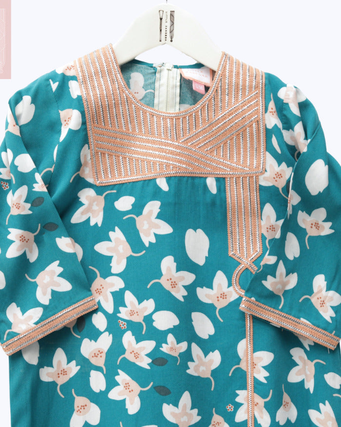 Model wears Petroleum Blue Floral Talli