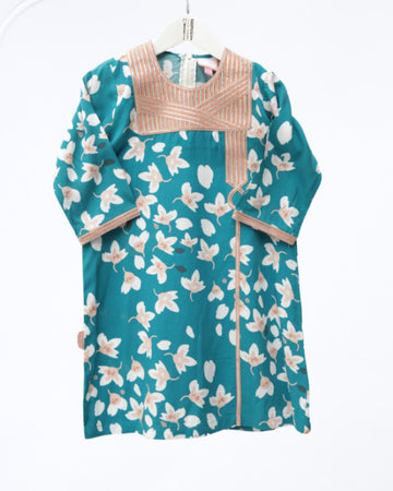 Model wears Petroleum Blue Floral Talli