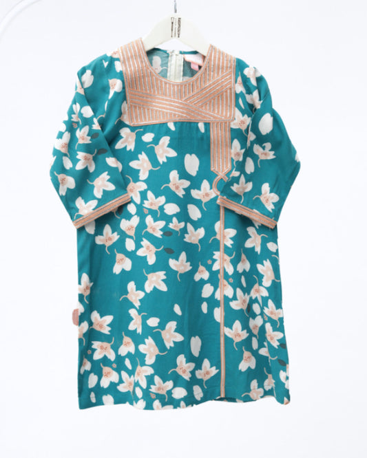 Model wears Petroleum Blue Floral Talli