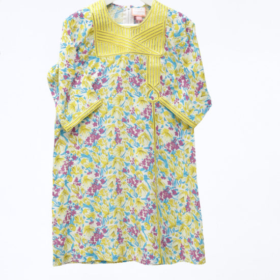 Model wears Yellow Floral Talli