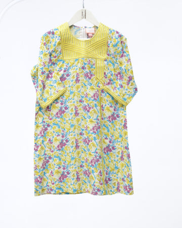 Model wears Yellow Floral Talli