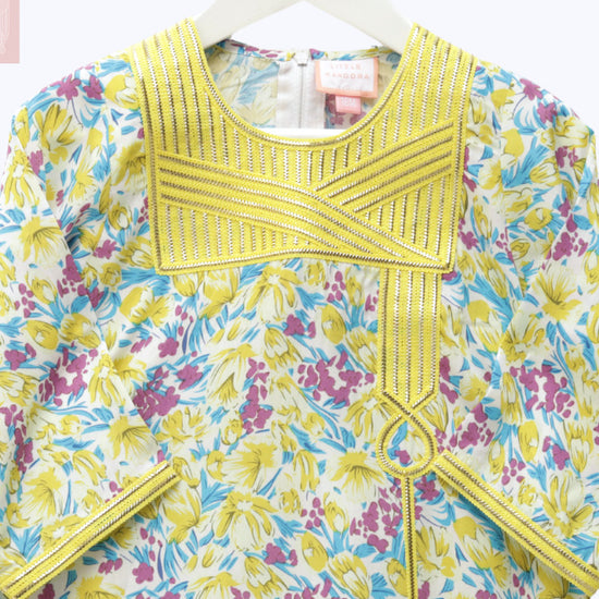 Model wears Yellow Floral Talli