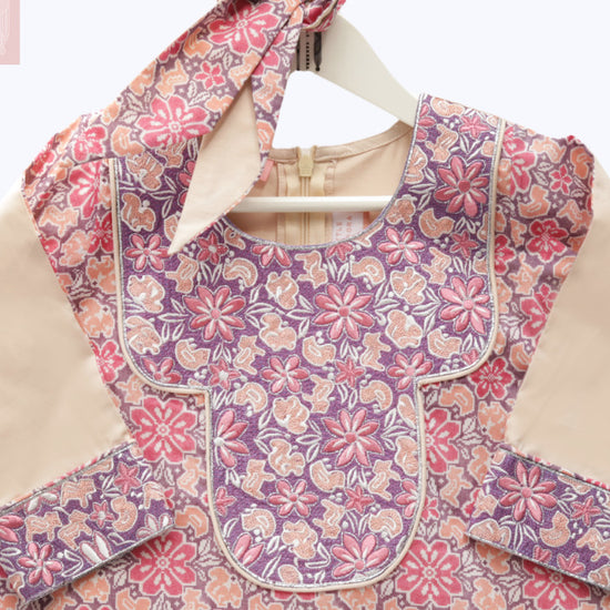 Model wears Peach And Rose Hyde Park